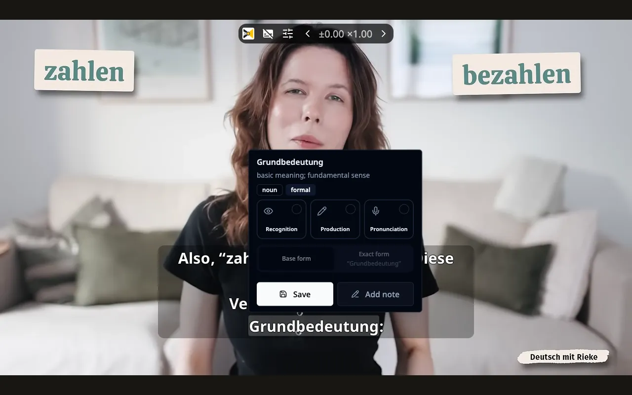 Flicktionary showing the meaning of a French phrase in a popover above YouTube subtitles